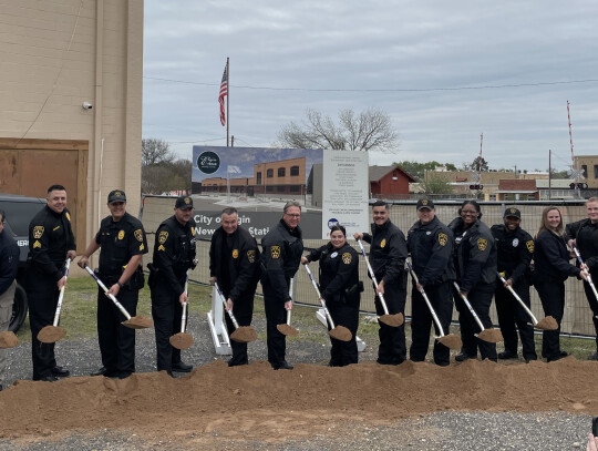 Elgin Police Officers break ground at the site of the new planned police station March 20. Pictured are, from left, Commander Aaron Crim, Corporal Ted Hernandez, Sgt. Todd Johnson, Sgt. Cameron Jonse, Corporal Jordan Real, Corporal John Stone, Chief Chris Noble, Officer Lucero Dominguez, C...