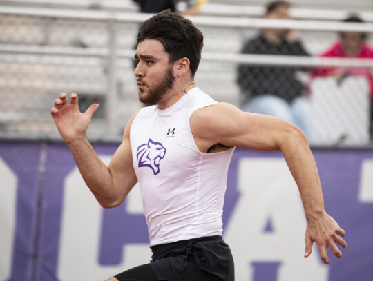 Jonathan Muerin runs a 23.58 in the 200-meter dash to secure a silver medal. Photo by Erin Anderson