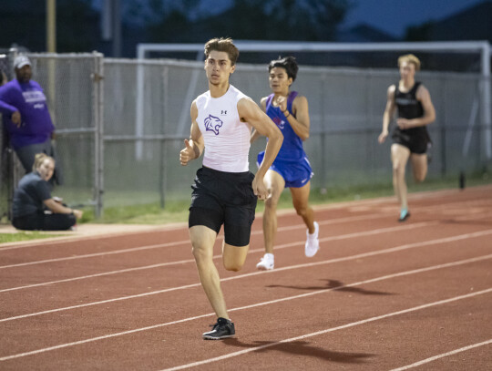 Justin Strong collected three gold medals at the Wildcat Relays in Elgin. Photo by Erin Anderson