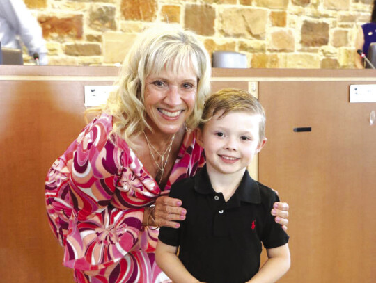 Councilmember Cynthia Sanders grandson, Clayton Cannon, led the pledges at last week’s Bastrop City Council meeting. Photo courtesy of the city of Bastrop Facebook page