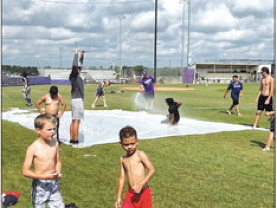 Young Wildcats have a lot of fun on the slip-and-slide during the final day of baseball camp on Thursday, June 1 at the high school baseball field. Photos courtesy of Elgin ISD