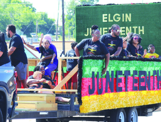 The Juneteenth parade had 35 entries that included floats, classic cars, walkers and horseback riders. Photo by Jason Hennington