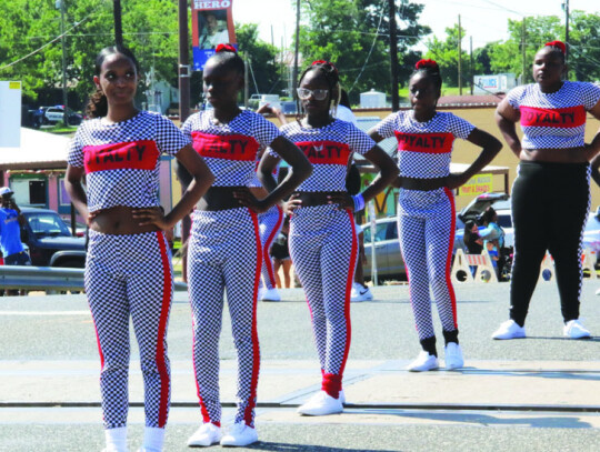 A youth dance team was one of the many participants in the Juneteenth parade. Photo by Jason Hennington