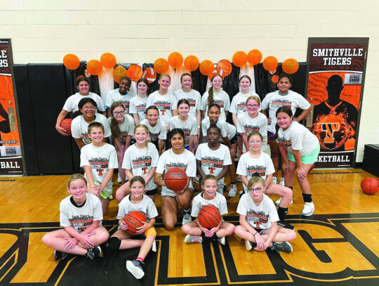 Smithville girls in sixth through ninth grade happily gather around on Thursday, June 15 during the Advanced Lady Tigers Basketball Camp in the junior high school gym. Photos courtesy of Smithville Lady Tiger Athletics Photo courtesy of Smithville Lady Ti