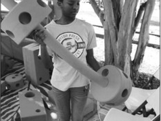 The impromptu playground was a hit during Elgin’s Juneteenth celebration. Photo by Jason Hennington