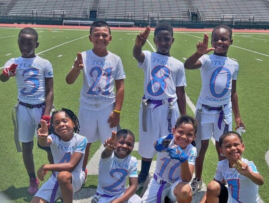 Elgin 8U flag football happily poses for a photo together on July 21 following a game against the 8U Chengdu Crimson Tide Eagles in Round Rock. Photo courtesy of Amanda Harvey