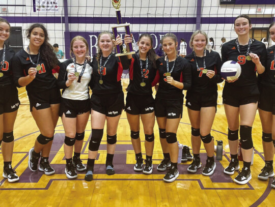 The Smithville High School varsity volleyball team celebrates Saturday, Aug. 12 after winning the Sugar and Spike tournament at Florence High School. Photo courtesy of Smithville Lady Tiger Athletics