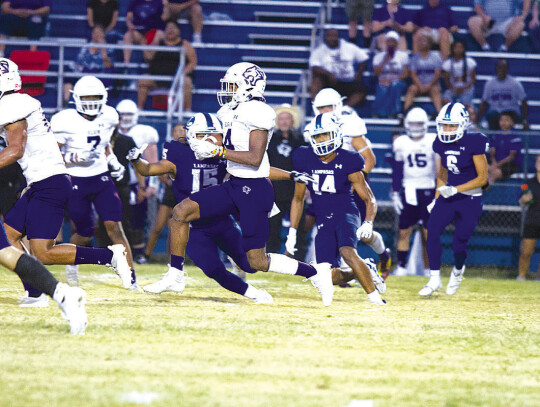 Wildcats varsity football senior running back Curtis McFarlin gains extra yardage on Friday night during Elgin’s season opener at Lampasas. Photo courtesy of Hunter King / Lampasas Dispatch Record