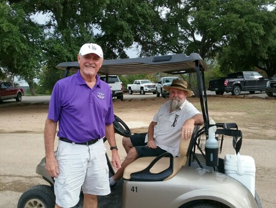 Johnny Klemm (left) and Mike Brune (right) volunteer on Sept. 16 during the second annual Relay For Life of Elgin Golf Tournament. Photo courtesy of Ruth Hyatt