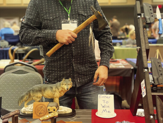 Jeff Davidson Custom Knives with his winning tomahawk. Photo by Niko Demetriou