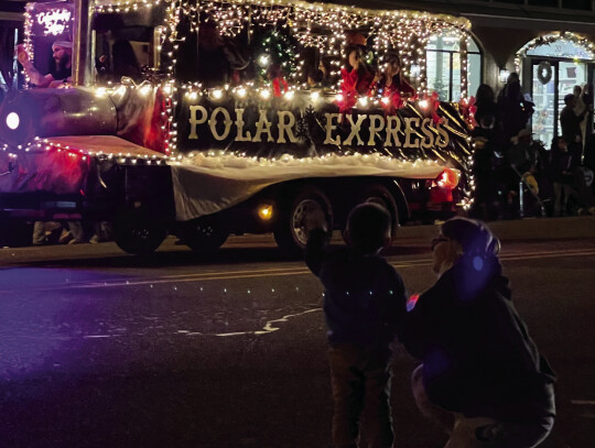 The Polar Express on its way to Elgin’s storied railroad tracks. Photo by Niko Demetriou