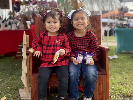 Addilyn and Laylah, fans of the season. 