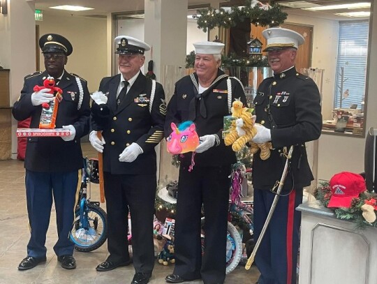 T.J. Jenkins, Bert Cruise, Bob Prendergast and John Hobbs, of the Bastrop County Veterans Honor Guard, delivered items to Frontier Bank’s Toys for Tots collection this past week. The United States Marine Corps has long been affiliated with the donation-based program. Photo courtesy John Ho...