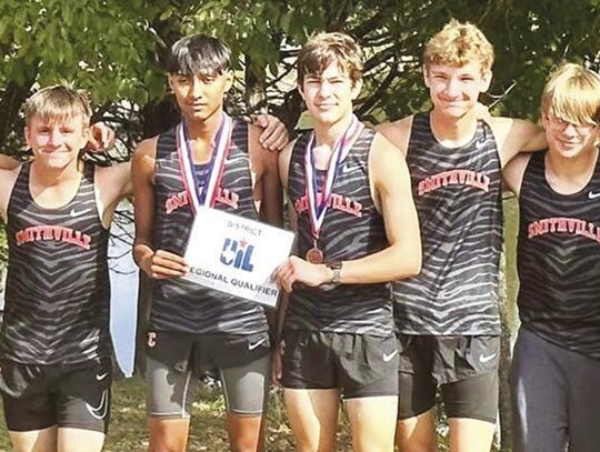 The Smithville High School boys varsity cross country team happily poses together Oct. 12 after competing in the 4A-District 22 meet held at Camp Tejas in Giddings. Photo courtesy of Smithville Athletic Booster Club