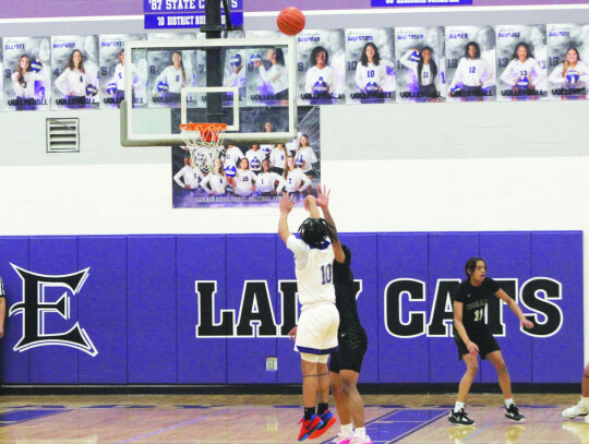 Wildcats varsity basketball sophomore Tyson McFarlin shoots from three-point range Jan. 3 during Elgin’s district home game against Pflugerville Connally. Photo by Andrew Salmi