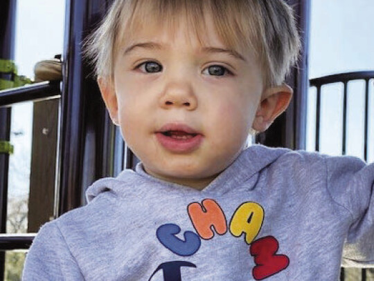 Little Logan has plenty of room to climb on the new playground at 802 N. Ave. C. Photo courtesy Lillian Gates