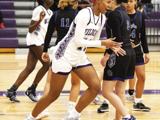 Elgin High School girls varsity basketball junior Sabra Baker in action Jan. 9 during the Lady Wildcats’ dominant 47-17 victory against Cedar Creek High School. Photo by Erin Anderson